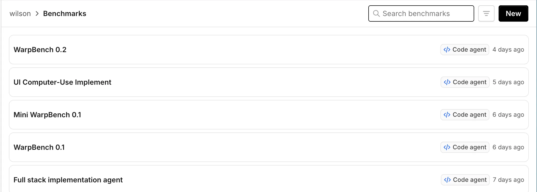 The Benchmarks page showing saved benchmark suites, a search field, and the New button.